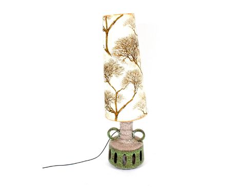 A large pottery table lamp with printed tapering shade 