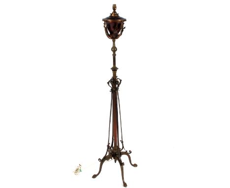 A copper and brass Art Nouveau adjustable standard lamp converted to electricity (sold as collector's item)