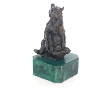 A bronze figure a bear raised on marble plinth 