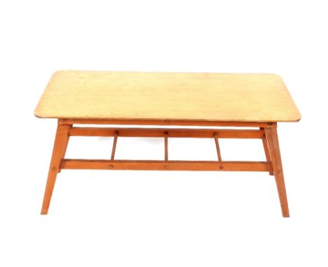 A 1960's light wood oblong coffee table with magazine rack under tier, 92cm long 