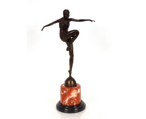 An Art Deco style bronze figure of a dancing girl on marble plinth, 57cm high 