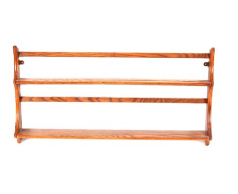 A light Ercol plate rack