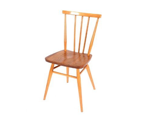 A set of six light Ercol stick back dining chairs 