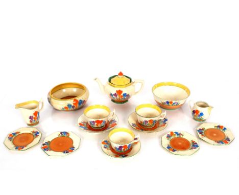 A collection of Clarice Cliff "Crocus" pattern china teaware to include Athens shaped tea pot and milk jug, a pair of breakfa