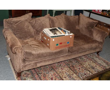 A Kingsley &amp; Co modern three-seater sofa covered in brown corduroy style fabric with scatter cushions 