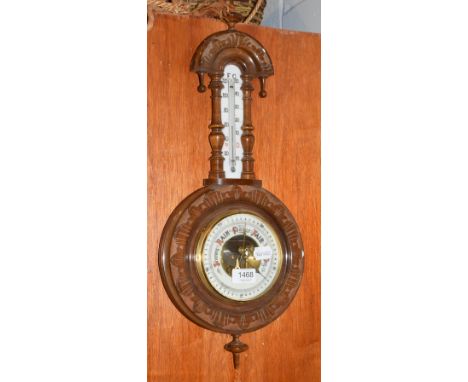 A walnut aneroid wheel barometer, circa 1900 
