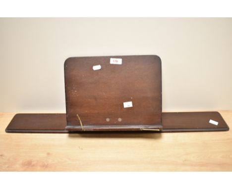 A vintage mahogany book stand.