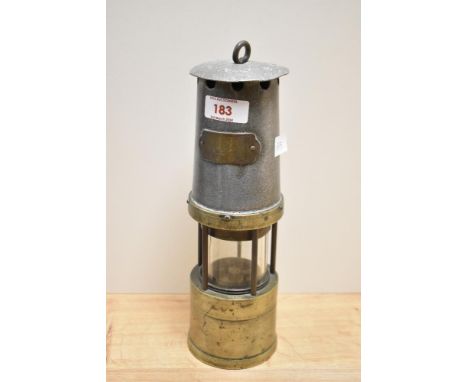 A traditional miners safety lamp.