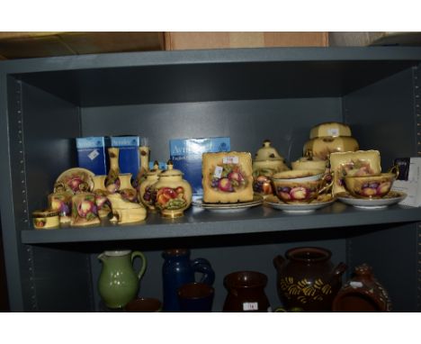A collection of Aynsley Orchard Gold patterned items, with boxes, to include a lidded ginger jar, a pair of bud vases, bells,
