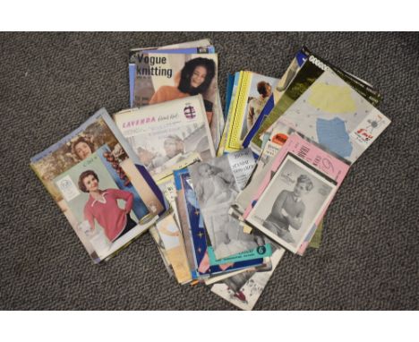 A collection of vintage knitting patterns, including men's, women's and children's.