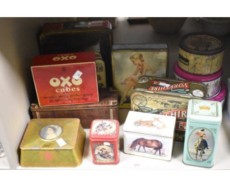 A selection of vintage advertising tins, including OXO and Quality street.