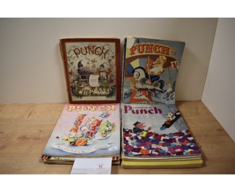 A collection of vintage Punch magazines, predominantly 1930s to 1960s.