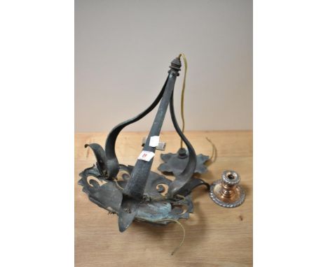 An early 20th century copper electrolier and a Victorian silver plated candlestick.