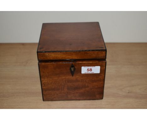 A late 18th/early 19th Century Sheraton period tea caddy, ebony banded, and opening to a fitted and lined interior, measuring