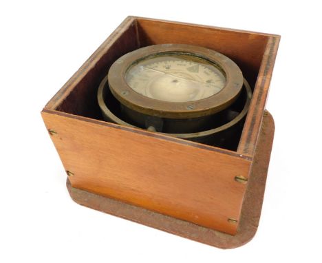An early 20thC brass cased gimbal compass, boxed, lacking lid. 