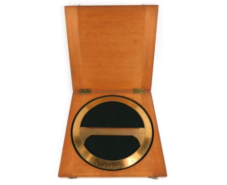 A Stanley brass circular protractor, stamped Stanley, Great Turnstile, Holborn, London, mahogany cased, bears partial label, 