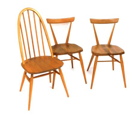 A group of three Ercol ash and elm Windsor kitchen chairs. 