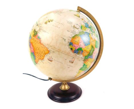 An electric tabletop spinning terestial globe, 34cm high. 