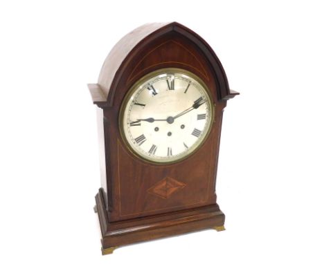 A 19thC mahogany bracket clock, with lancet top, silvered dial with Roman numerals, eight day chiming movement, with brass br