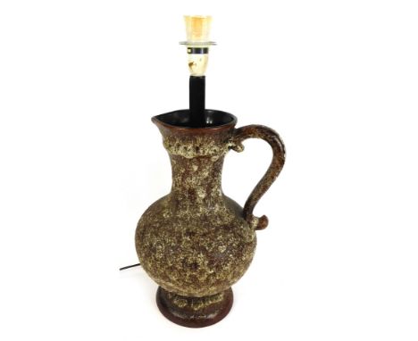 A Western Germany brown mottled jug table lamp, 58cm high.Buyer Note: WARNING! This lot contains untested or unsafe electrica