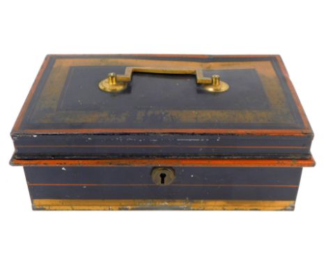 A vintage metal deeds box, on black painted ground, with a gold border and brass swing handle.