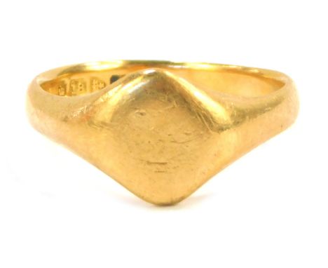 An 18ct gold signet ring, of plain design of oval shield, size R, 7.7g all in.