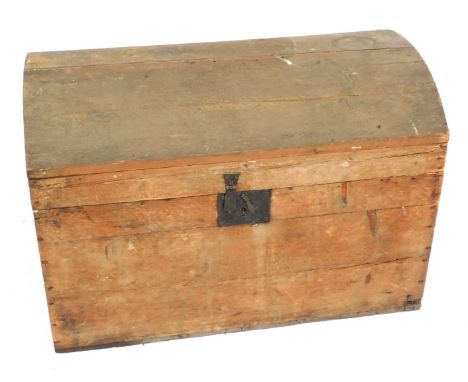 A Victorian pine dome trunk, with cast iron carrying handles and lock plate, 50cm high, 69cm wide, 45.5cm deep. 