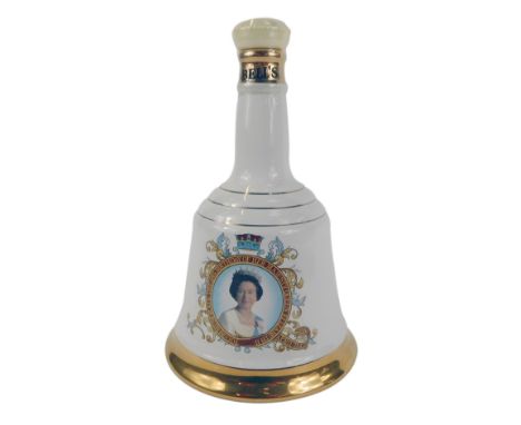 A Bell's commemorative pottery Scotch whisky decanter, To Commemorate the 60th Birthday of Her Majesty Queen Elizabeth II, wi