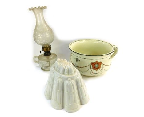 A Royal Doulton Albany chamber pot, late 19thC turreted top jelly mould, and a clear glass oil lamp, with a fluted floral sha
