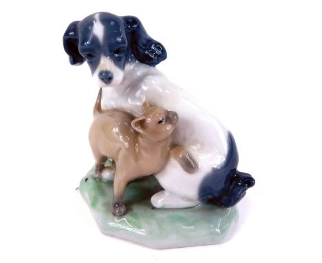 A Nao by Lladro porcelain figure group, of a dog and cat, 11cm high. 