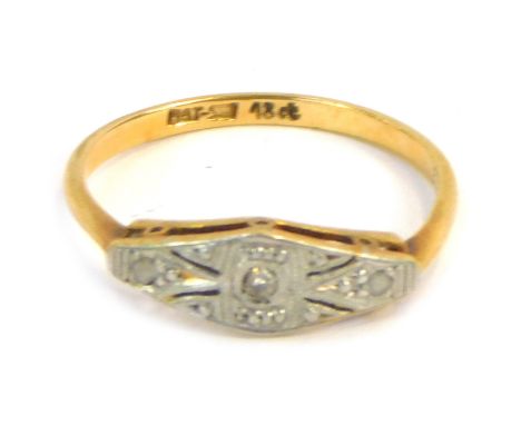 An 18ct gold and platinum diamond dress ring, with diamond shaped platinum panel set with tiny diamonds, on a yellow metal ba