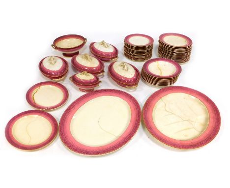 A late 19thC Royal Worcester pottery part dinner service, decorated on a pink ground with gilt borders, printed mark and regi
