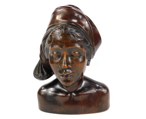 An early 20thC carved hardwood bust of a lady, identified by a label on the base as Winifred E K Burtt, believed to have died