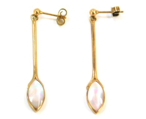 A pair of 9ct gold mother of pearl drop earrings, each with tear drop base on elongated stem, with stick pin back, on butterf