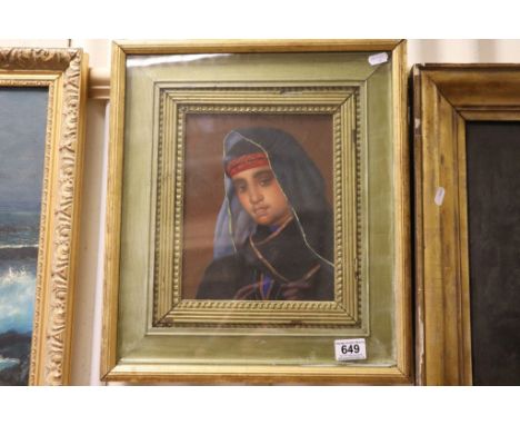 An oil painting portrait of a middle eastern boy in traditional gown and head gear