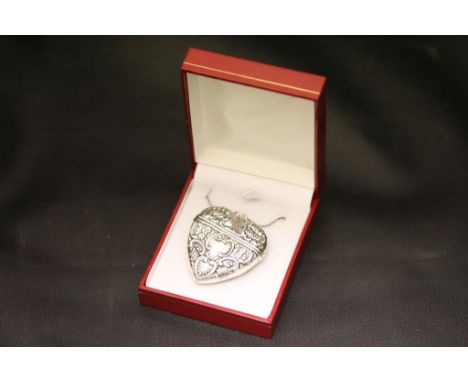 A large silver heart shaped locket on chain, cased