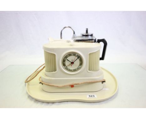 Goblin, cream plastic, chrome & ceramic Teasmaid with clock