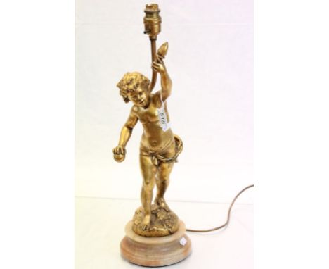 Vintage gilt finished lamp with cherub on an Onyx base