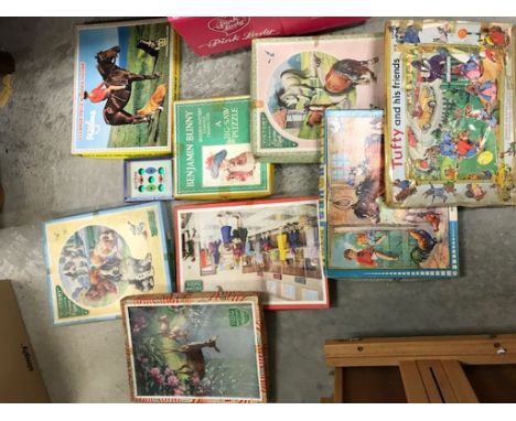 A quantity of vintage jigsaws to include Beatrix Potter.