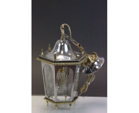 Glazed panel ceiling lamp on a hanging chain