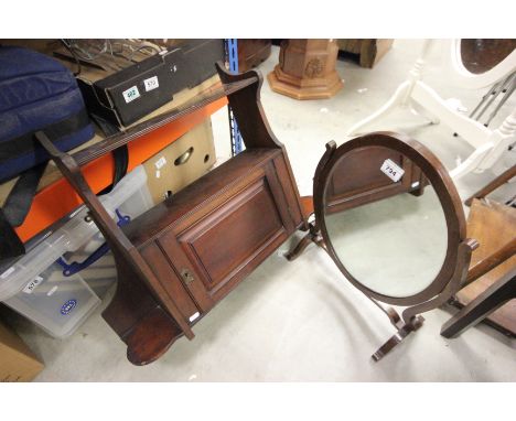 Victorian Mahogany Oval Swing Mirror and an Edwardian Hanging Shelf with Cupboard