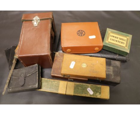 A cased set of vintage Philip Harris weights, cased Record Minor Insulator Tester, cased Griffin weights, cased geometry set,