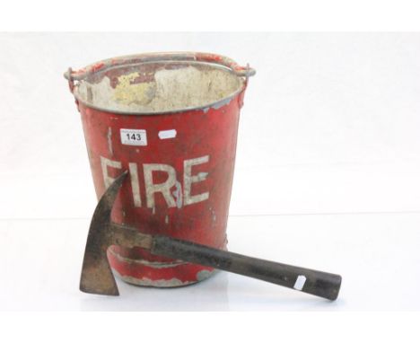 Red painted metal bucket with "Fire" painted on the side in white and an RAF fire Axe