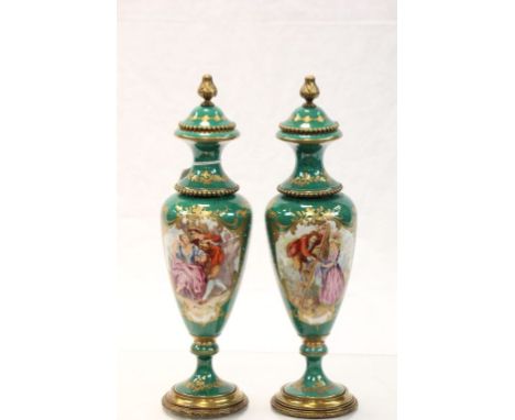 Pair of Limoges ceramic Urns with fixed lids