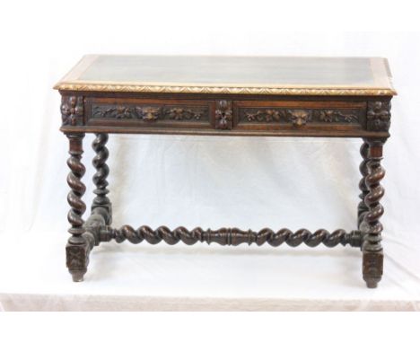 Victorian Oak Heavily Carved Writing / Side Table with black leather inset top, the two drawers with lion mask handles, raise