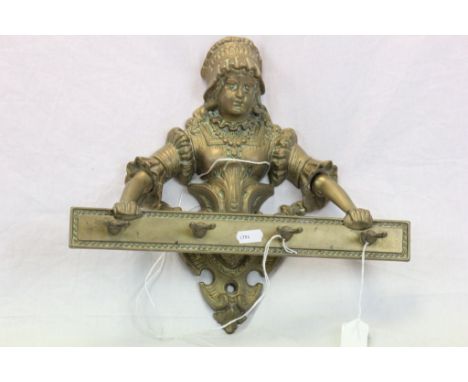 Heavy Brass pipe rack in the form of a Female in a Bonnet