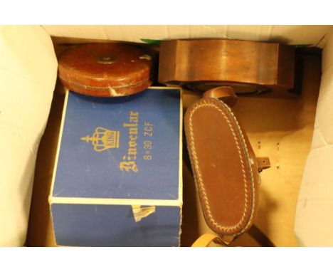 A quantity of vintage cameras accesories and binoculars plus slides and projector. 