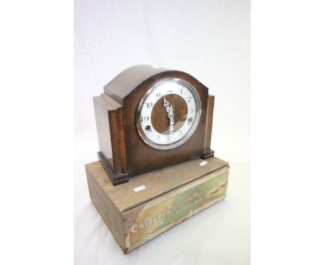 Wooden Cadbury's Dairy Milk Chocolate box with paper labels and a wooden cased mantle clock with Westminster chimes
