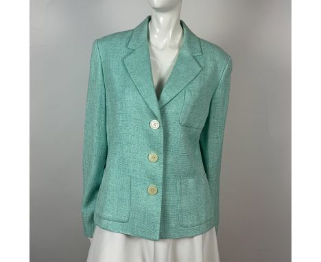 Tweed lined jacket with 3 button closure and 3 front pockets. Michael Kors tag. Issued: 20th centuryDimensions: Sz. 12Manufac
