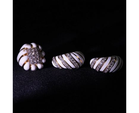 Stunning attributed to David Webb set in 18K gold and platinum with delicate white enamel and 2ct diamond on earrings and 3ct